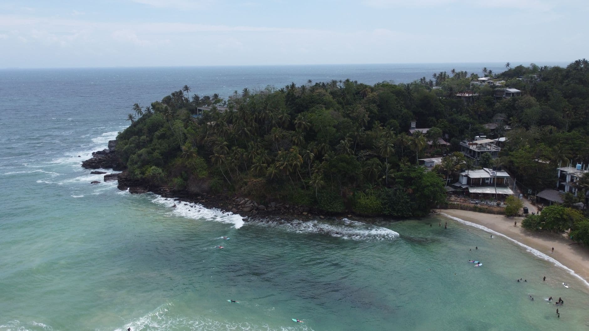 The palm-ringed horseshoe of Hiriketiya Bay