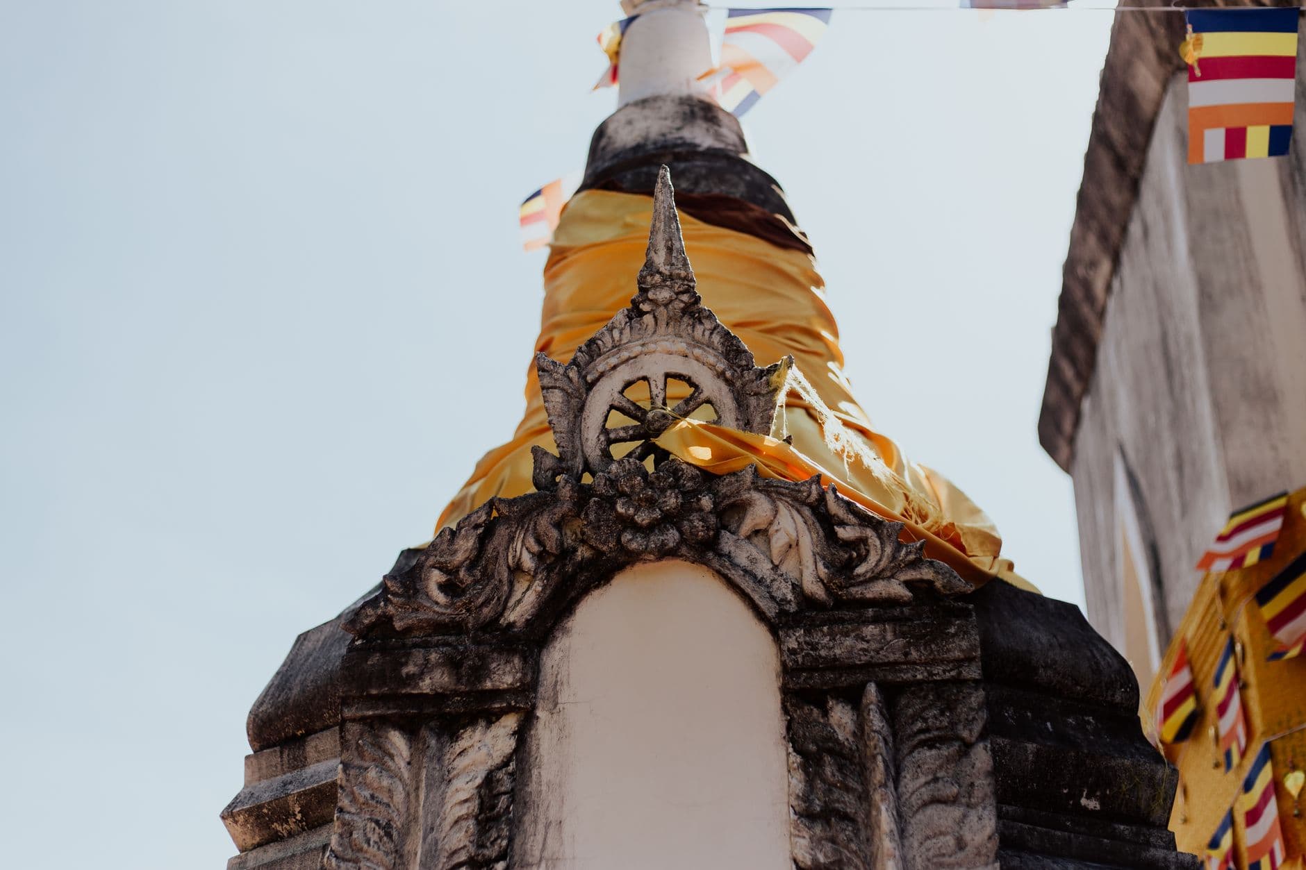 A Buddhist stupa and prayer flags at a Colombo temple