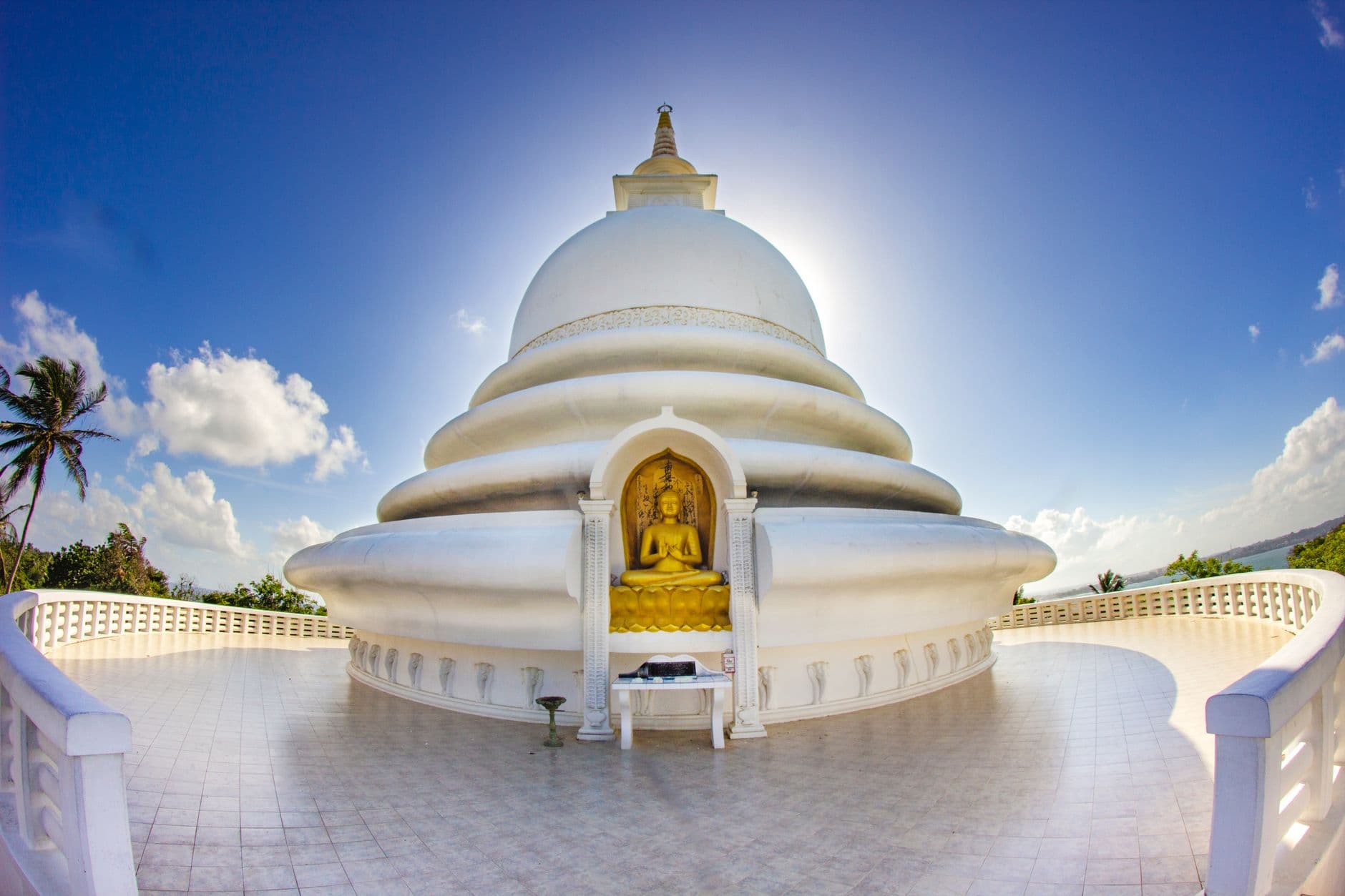 The white Peace Pagoda on the headland above Unawatuna