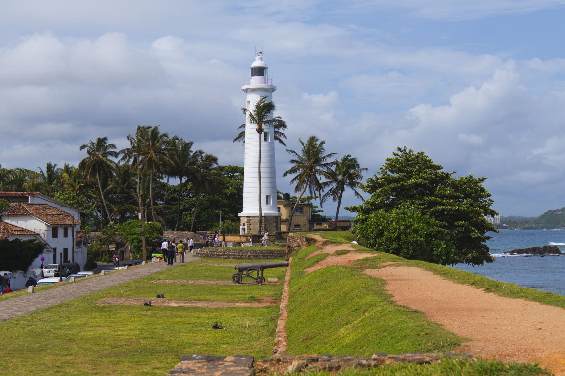 Ramparts and lighthouse of Galle Fort at sunset